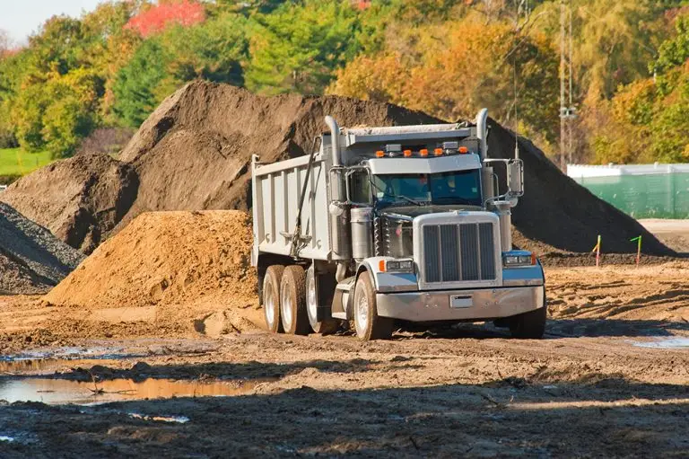 A dumptruck hauling dirt